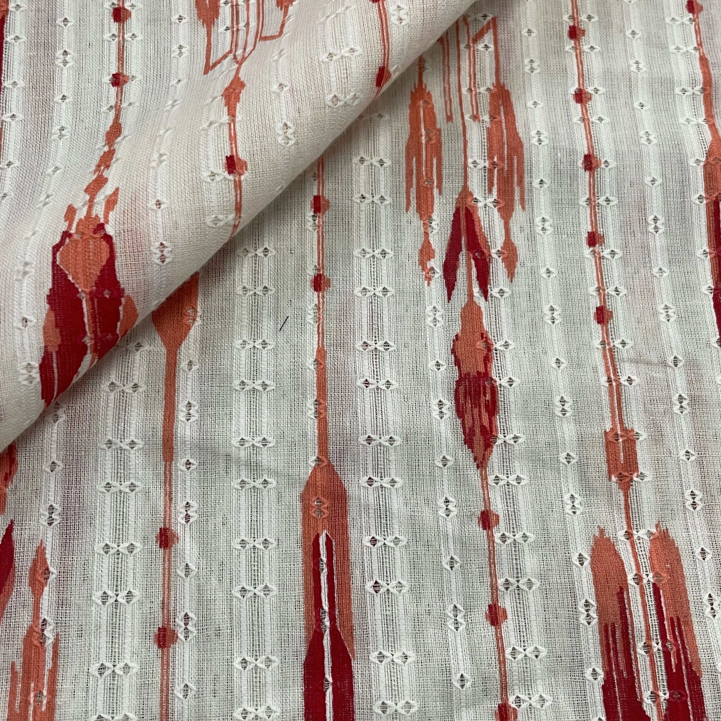 OffWhite Orange Ikkat Dobby Embroidery Dyeable Cotton Fabric
